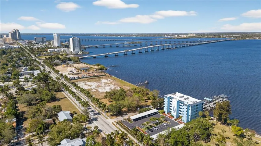 View of urban area featuring a notable bridge and a nearby body of water