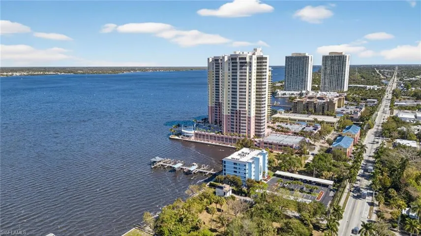 View of urban area featuring a nearby body of water
