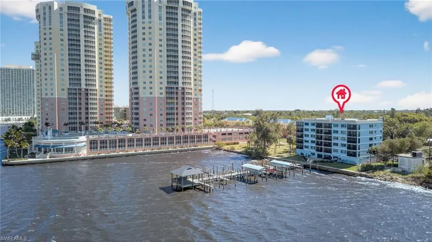 Water view with a boat dock