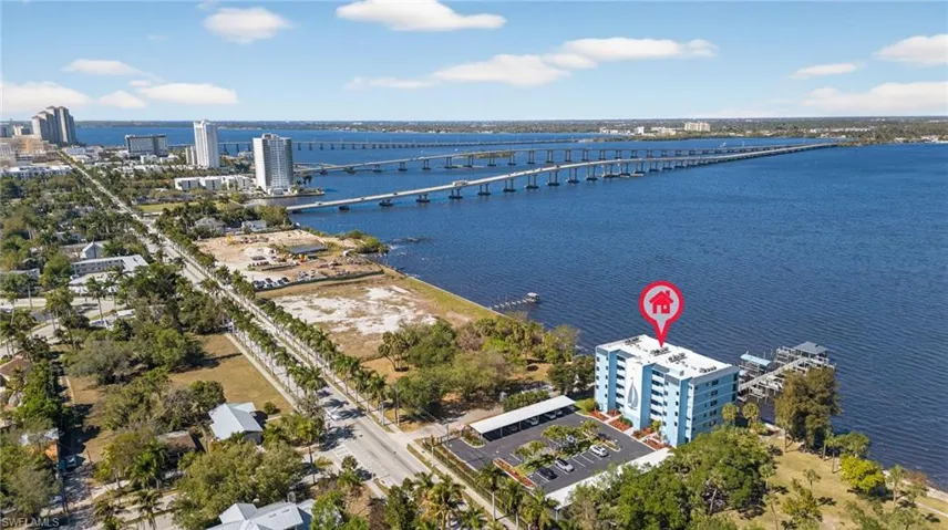 View of urban area featuring a notable bridge and a nearby body of water
