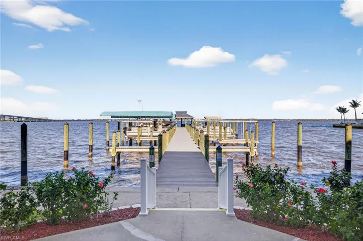 Dock featuring a water view