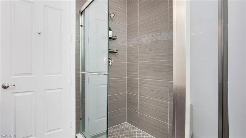 Full bath featuring a stall shower