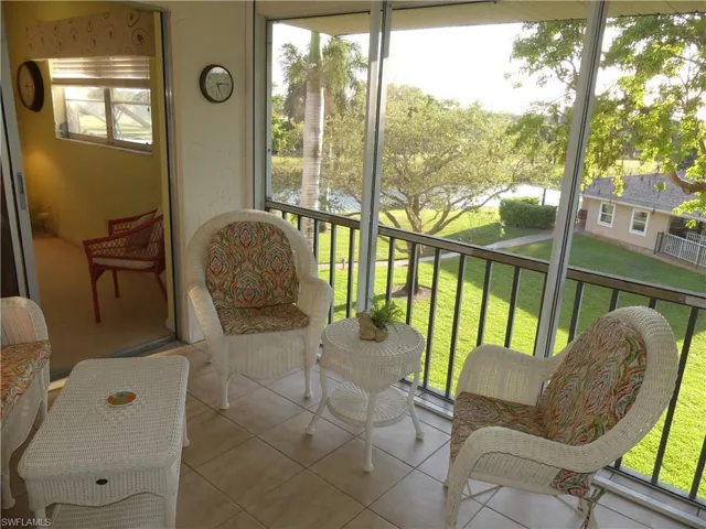 ENJOY THE GULF BREEZES FROM YOUR SCREENED LANAI OVERLOOKING SERENE WATER WAY