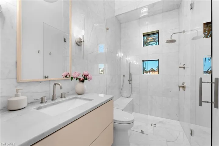 Solid White marble Bathroom with all walls in marble!