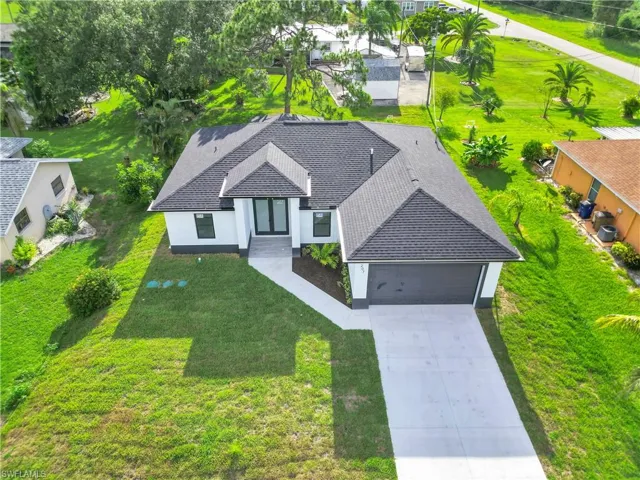 Aerial view of property and surrounding area