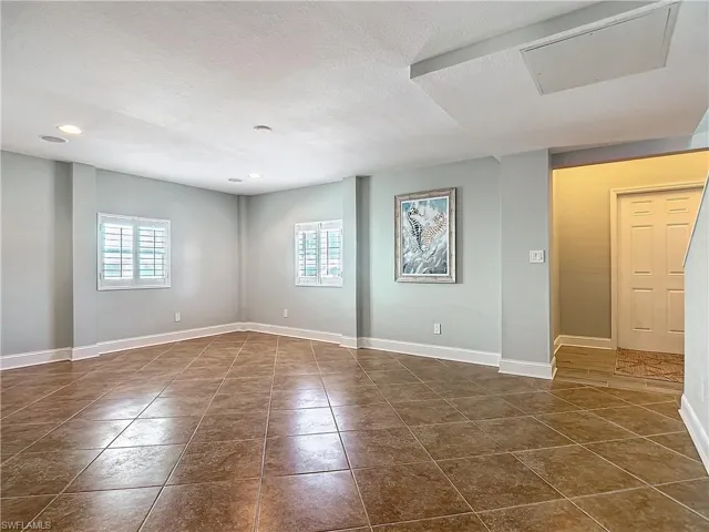 Downstairs tiled living area or guest quarters