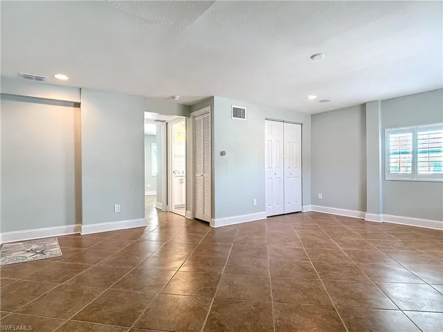 Downstairs tiled living area or guest quarters