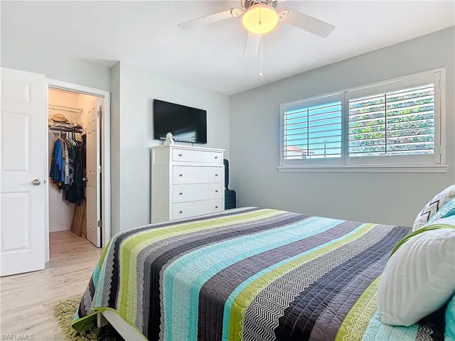 Guest bedroom with walk-in closet