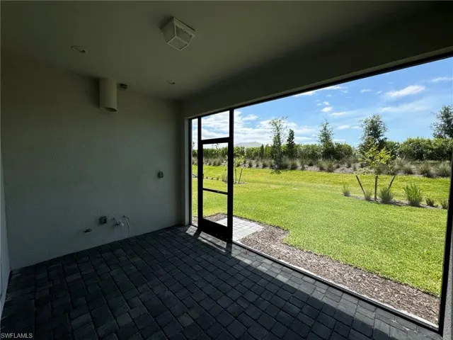 Covered lanai with screen enclosure, privacy wall and pre-plumbing for future outdoor kitchen