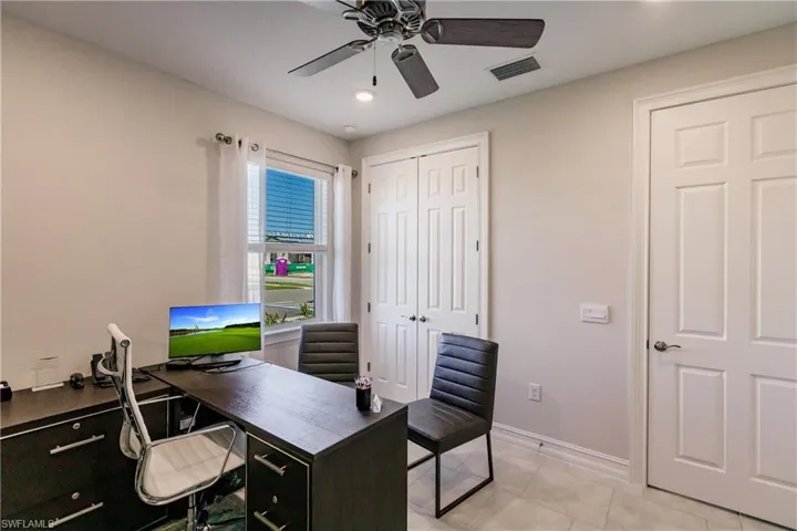Tiled office with ceiling fan