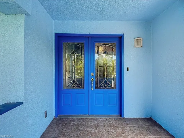View of exterior entry with french doors