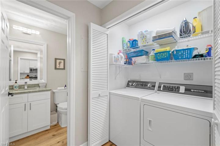 Speed Queen washer and dryer off of guest bath