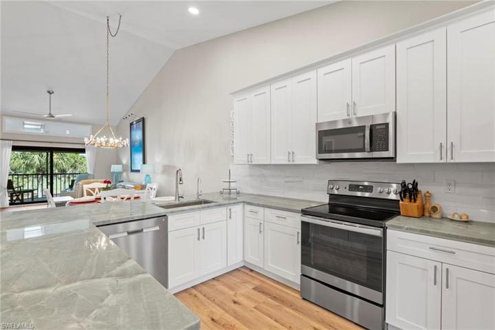 Kitchen open to dining/living area