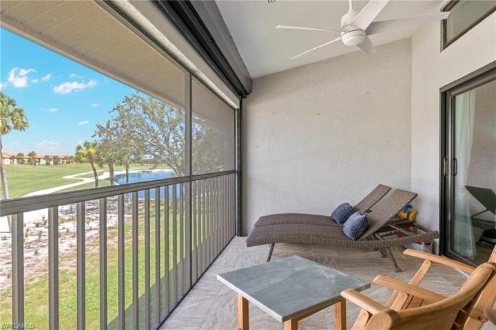 Golf course side lanai with impact transom window and sliders