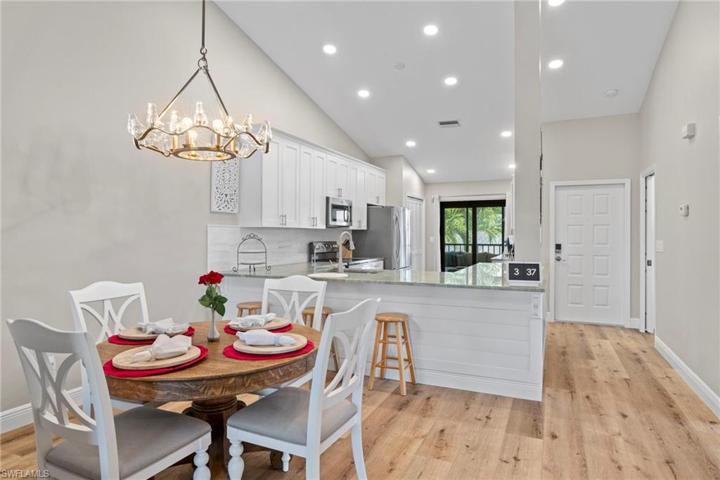 Dining area tio kitchen and entrance