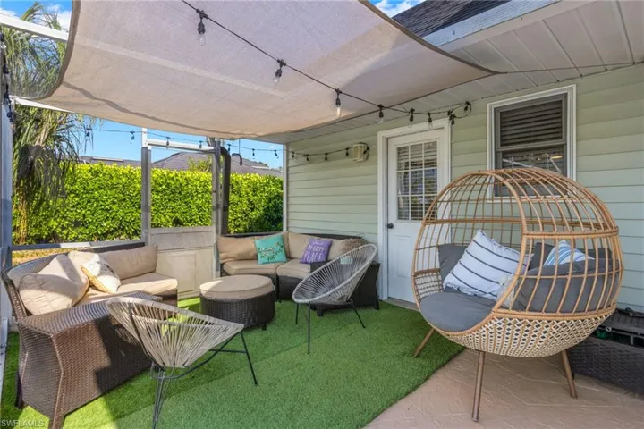 View of patio with an outdoor living space