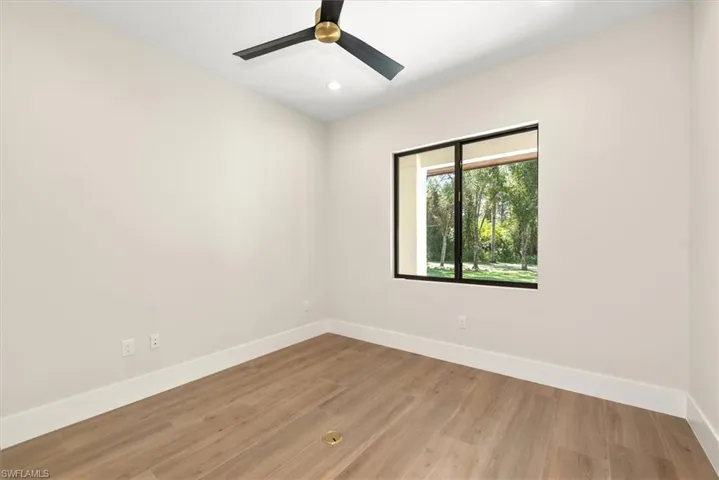 Unfurnished room with light wood-style floors and recessed lighting