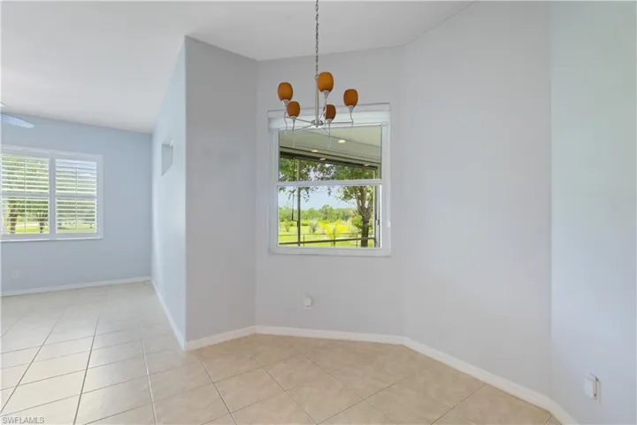 Tiled flooring extending throughout the space