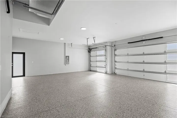 Garage featuring electric panel