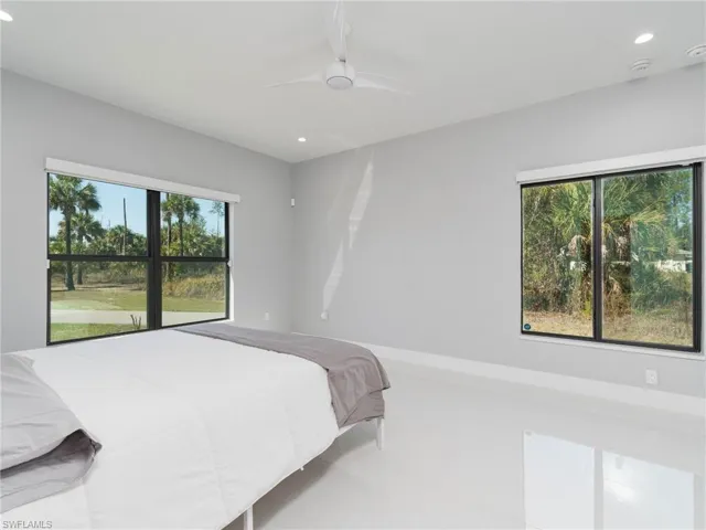 Bedroom featuring recessed lighting and a ceiling fan