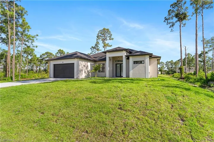 718  Phelps E ST, Lehigh Acres, FL 33974