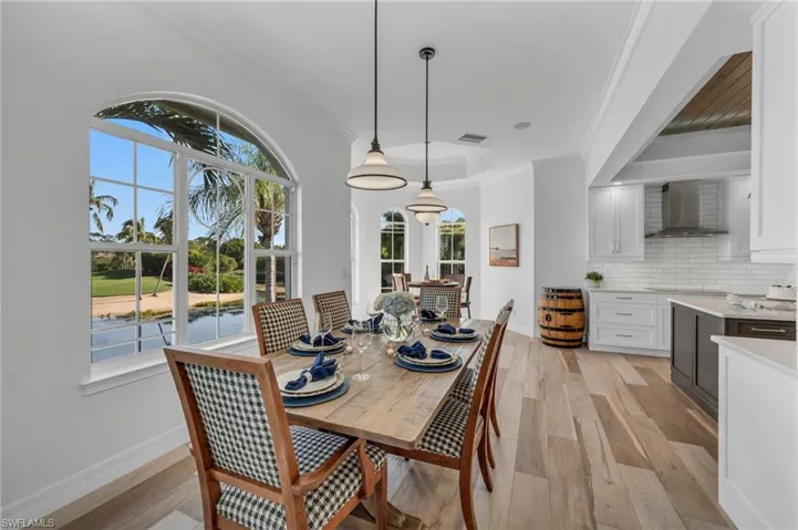 Plenty of space to entertain your family and guests in a dining room with views!