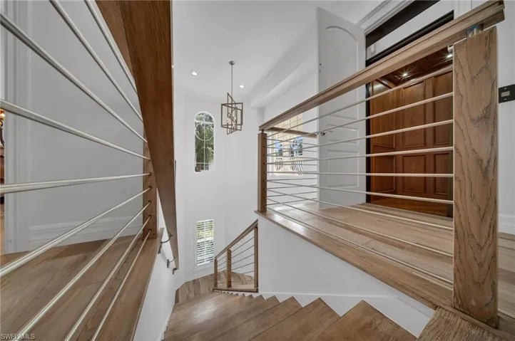 This architectural, contemporary staircase is just another reason this residence is so very unique in Terra Verde.