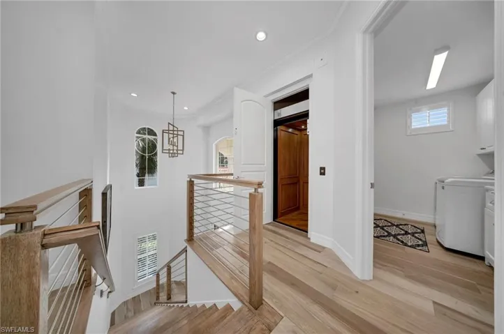 The residence comes equipped with a Garaventa, wood-surround elevator.