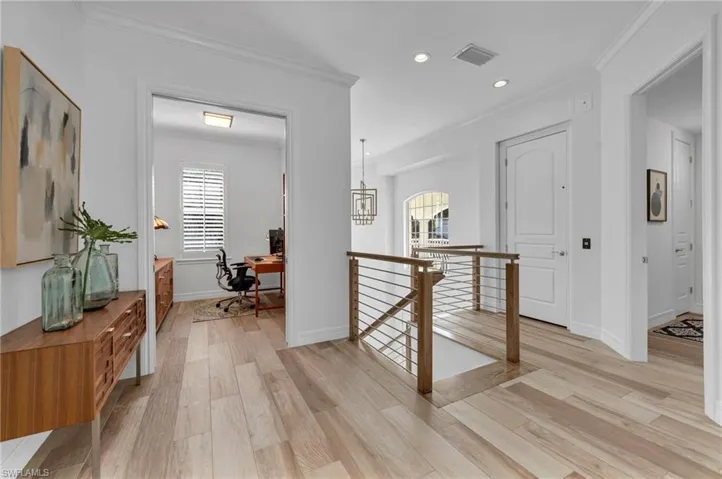 This uniques floor plan even allows for an in-home office, with pocket doors for privacy.