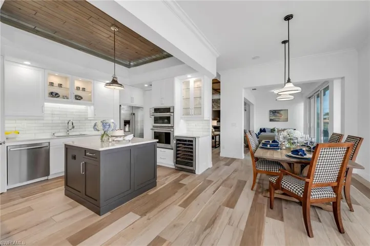 The completely renovated chef's kitchen comes with abundant quartz counter space, wine refrigerator, and all you need to whip up some great meals!