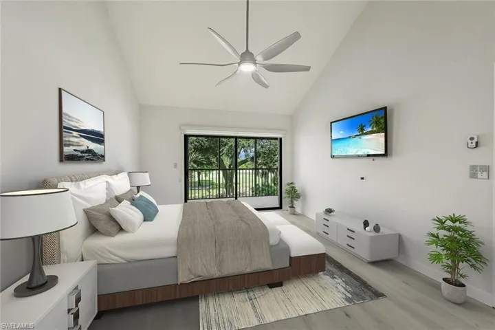 (Virtual Staged)- Primary Suite- Shown with a King Bed, Sliders to the Long Lanai- (window treatment-not virtual)