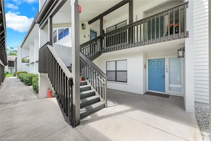 Newly Carpeted Stairs, Covered Front Door Entry