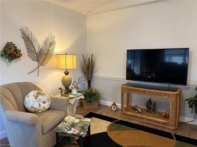 Living room featuring hardwood / wood-style flooring