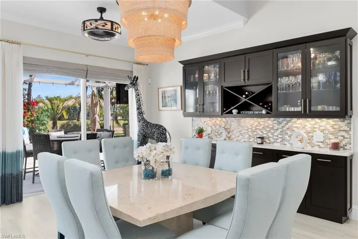 Dining space with ornamental molding