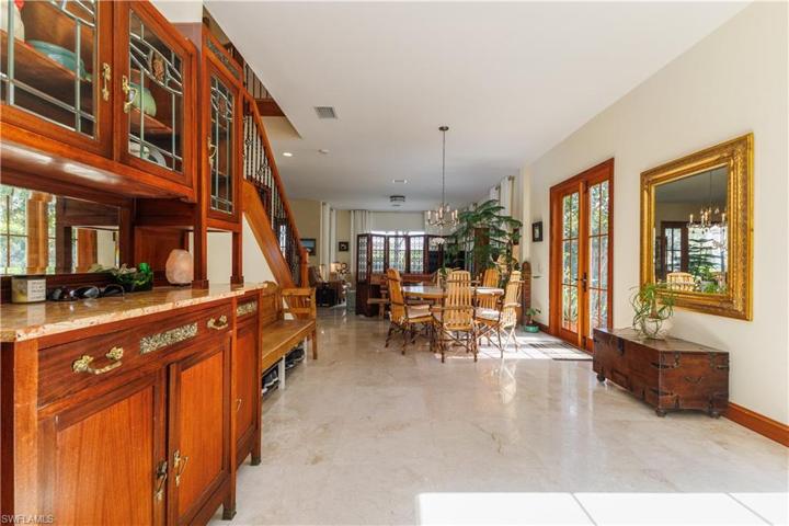 Brushed marble floors throughout ground level, 2’x2’ tiles