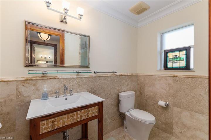 All bathrooms have brushed marble floors & walls.