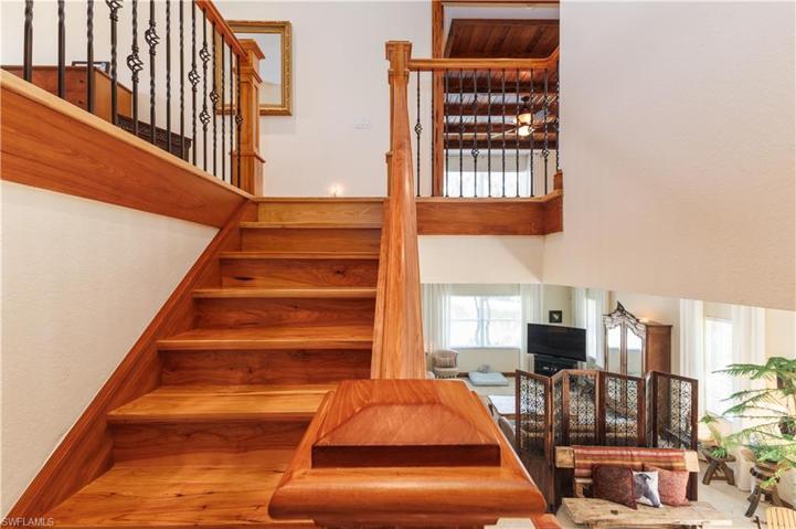 #3 Hickory custom staircase with wrought iron balusters