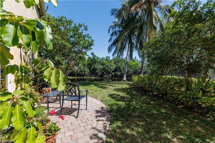 Large lot with privacy hedges and long lake views