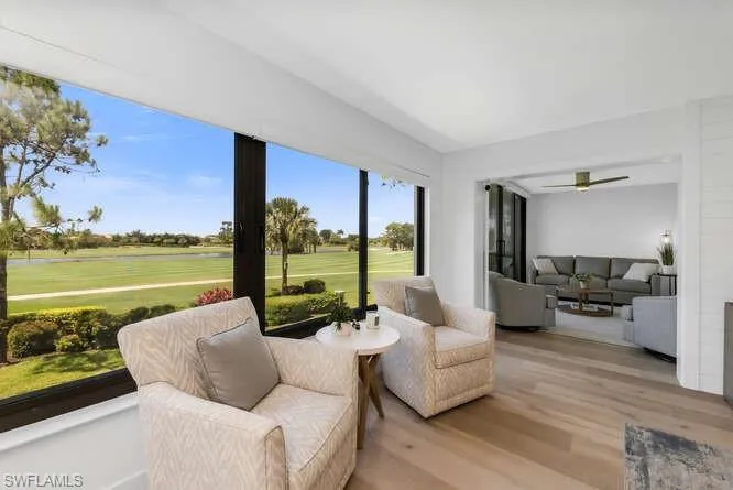 Sunroom / solarium with view of golf course