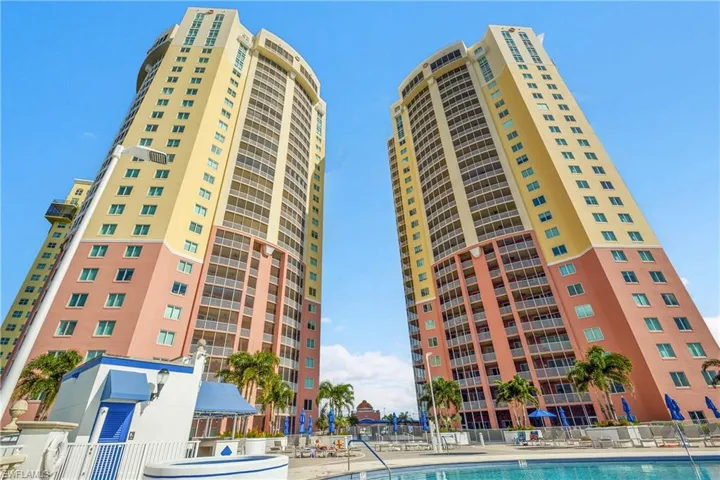 View of apartment building / complex with a community pool