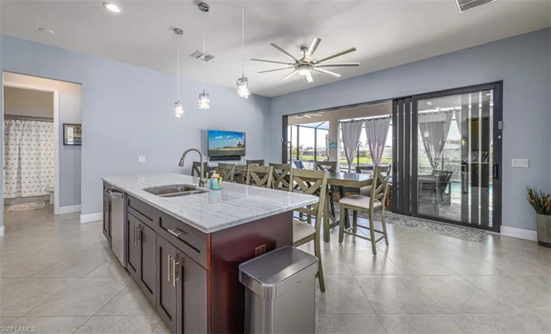 LARGE KITCHEN ISLANDSPACIOUS ENTERTAINING AREA WHICH OPENS TO THE LANAI BRINGING THE INDOOR OUTDOORS ENTERTAINING