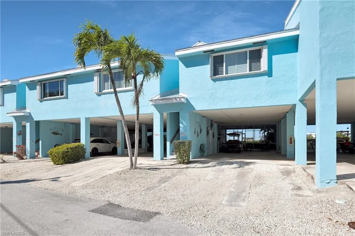 View of front of house featuring a carport