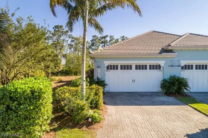 Two Car Garage with paver driveway