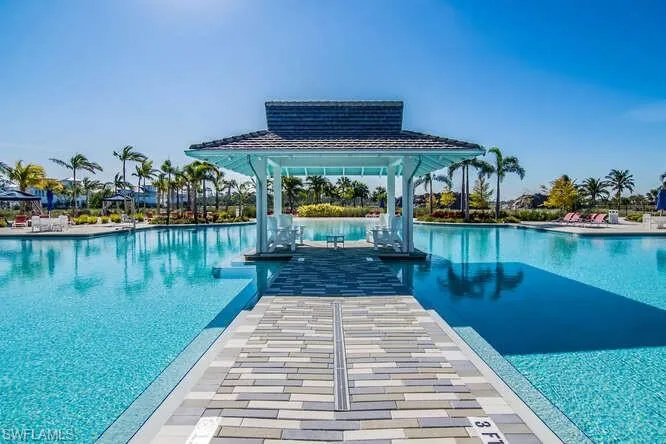 Community pool with a gazebo and a patio