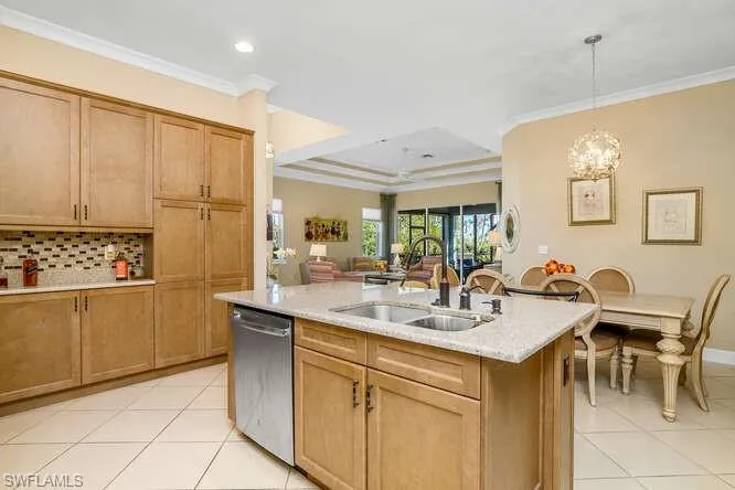 View of the great room from the kitchen area. Lots of cabinetry storage.