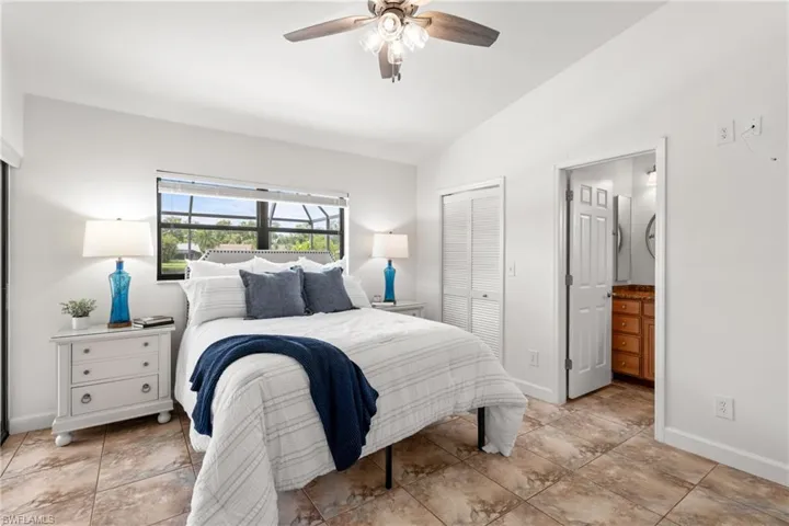 Primary Bedroom with a slider out the lanai