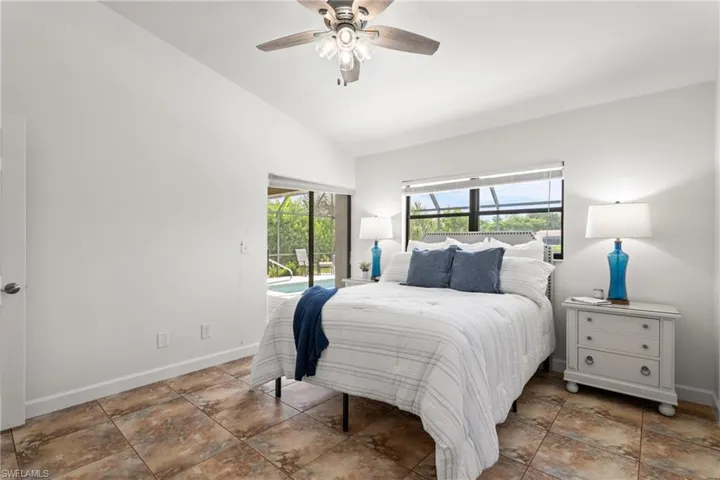 Primary Bedroom with a slider out the lanai