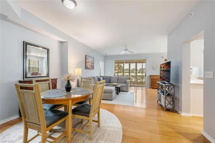 Dining space featuring light wood-type flooring and ceiling fan