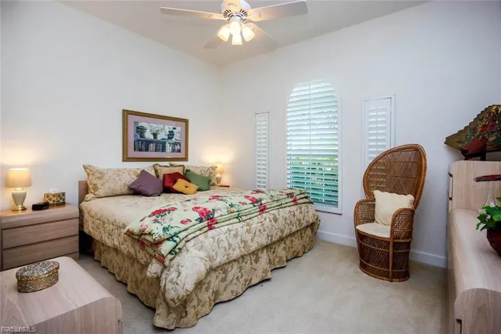 Bedroom featuring carpet and a ceiling fan