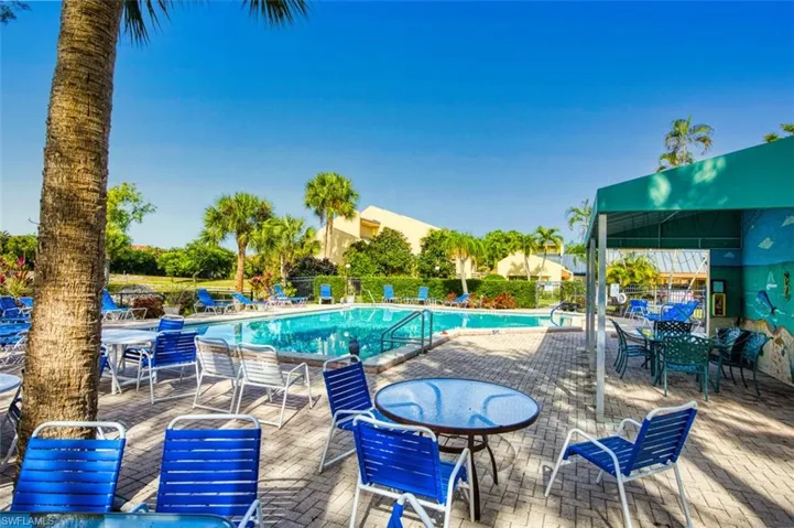 Community pool featuring a patio area